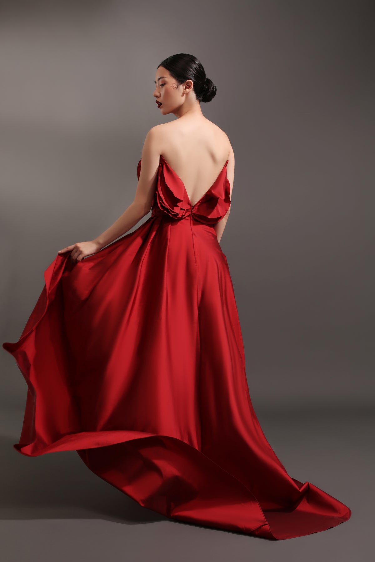 Red taffeta dress draped petals top with asymmetric skirt