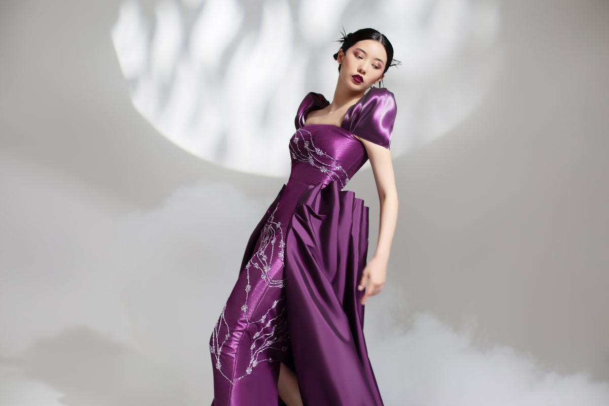 Puff sleeves fitted taffeta dress with draped overskirt
